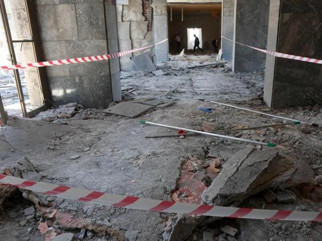 A man walks through rubble after the Grand National Assembly of Turkey was bombed by rebel jets. (AFP) A man walks through rubble after the Grand National Assembly of Turkey was bombed by rebel jets. (AFP)