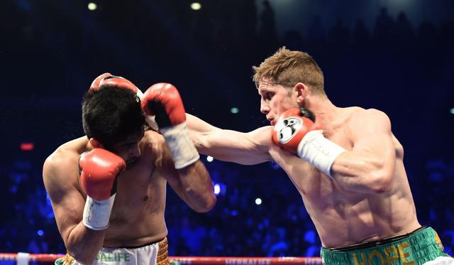 Vijender Singh (left) fights with Australia's boxer Kerry Hope for the WBO Asia Pacific Super Middleweight title in New Delhi. (AFP Photo) Vijender Singh (left) fights with Australia's boxer Kerry Hope for the WBO Asia Pacific Super Middleweight title in New Delhi. (AFP Photo)