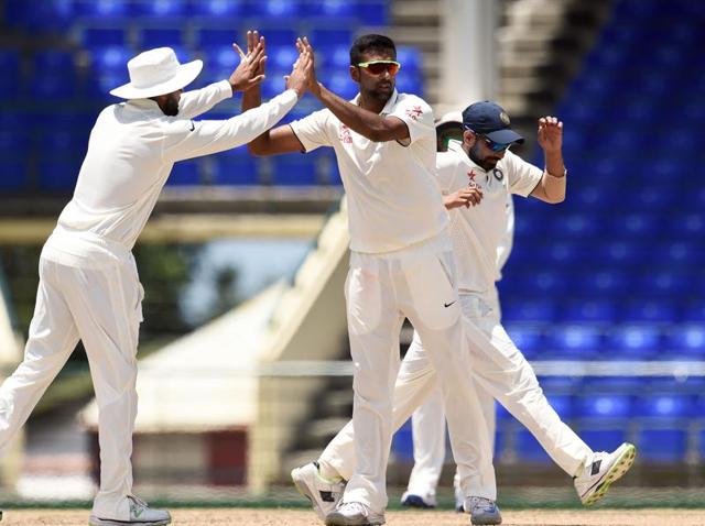 Indian cricketer Ravichandran Ashwin (L) celebrates dismissing WICB President's XI batman John Campbell. (AFP Photo) Indian cricketer Ravichandran Ashwin (L) celebrates dismissing WICB President's XI batman John Campbell. (AFP Photo)