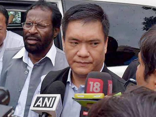 Designated Arunachal Pradesh CM Pema Khandu talks to reporters at Raj Bhawan after staking claim to form the Congress government in the state, in Itanagar. (PTI Photo) Designated Arunachal Pradesh CM Pema Khandu talks to reporters at Raj Bhawan after staking claim to form the Congress government in the state, in Itanagar. (PTI Photo)