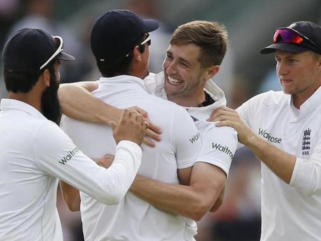 England's Chris Woakes celebrates taking the wicket of Pakistan's Sarfraz Ahmed with Joe Root and teammates. (Reuters Photo) England's Chris Woakes celebrates taking the wicket of Pakistan's Sarfraz Ahmed with Joe Root and teammates. (Reuters Photo)