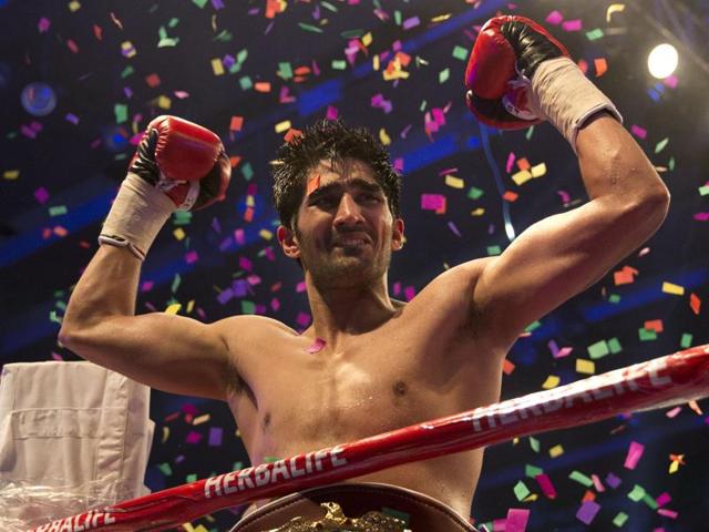 Indian boxer Vijender Singh celebrates after wining WBO Asia Pacific Super Middleweight title. (PTI Photo) Indian boxer Vijender Singh celebrates after wining WBO Asia Pacific Super Middleweight title. (PTI Photo)