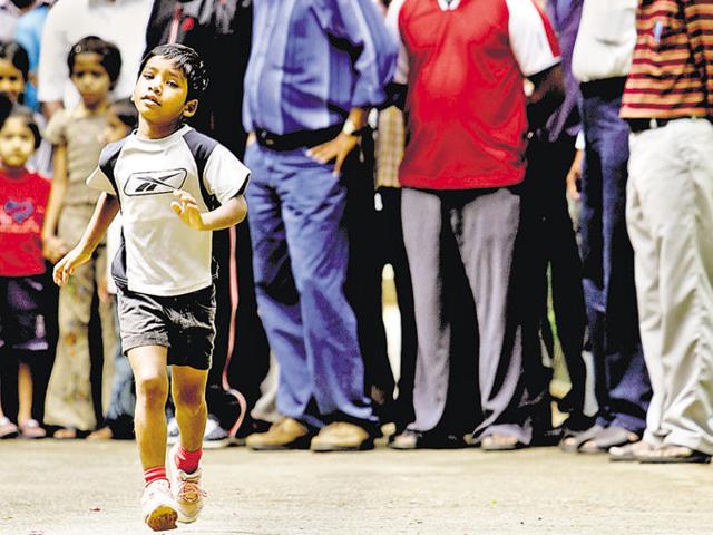 Budhia Singh runs in the grounds of the Press Club in Bangalore on 27 May 2006. The Marathon boy had allegedly disappeared by early June and was located in Kodaikanal on Sunday, police said. (AFP file photo) Budhia Singh runs in the grounds of the Press Club in Bangalore on 27 May 2006. The Marathon boy had allegedly disappeared by early June and was located in Kodaikanal on Sunday, police said. (AFP file photo)