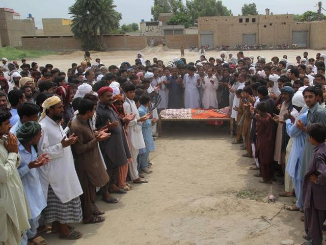 People offer prayers for social media celebrity Qandeel Baloch during her funeral in Shah Sadar Din village, around 130km from Multan in Pakistan. (AFP photo) People offer prayers for social media celebrity Qandeel Baloch during her funeral in Shah Sadar Din village, around 130km from Multan in Pakistan. (AFP photo)