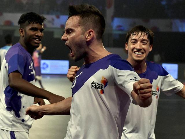 Kochi's Miguel Salgado (R) celebrates after scoring a goal against the Mumbai 5's (AFP Photo) Kochi's Miguel Salgado (R) celebrates after scoring a goal against the Mumbai 5's (AFP Photo)