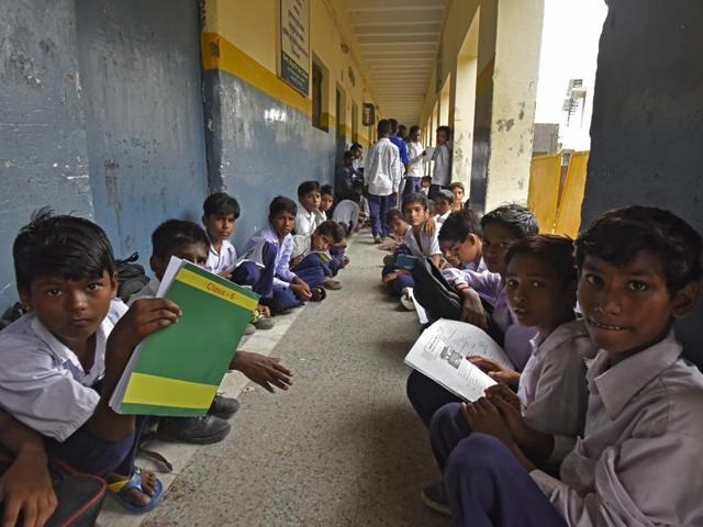 The school has only 32 rooms to fit 5,000 girls in the morning and 3,800 boys in the evening, taught by around 45 regular and 35 guest teachers. (Ravi Choudhary/ HT Photo)