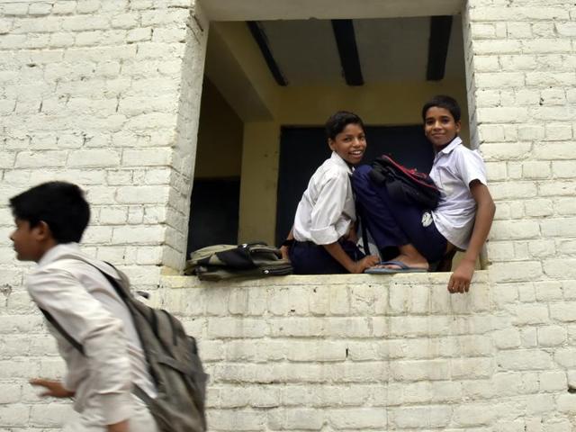 And some classrooms are just filled with students who do not even belong to the same class. (Ravi Choudhary/ HT Photo)
