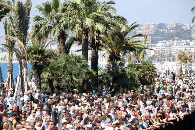 Thousands of people observe a minute of silence on the Promenade des Anglais in Nice on Monday, in tribute to the victims of the deadly Nice attack on Bastille day. (AFP) Thousands of people observe a minute of silence on the Promenade des Anglais in Nice on Monday, in tribute to the victims of the deadly Nice attack on Bastille day. (AFP)