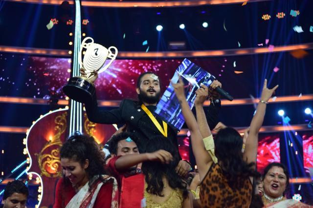 Kushal celebrates his victory on stage. Kushal celebrates his victory on stage.