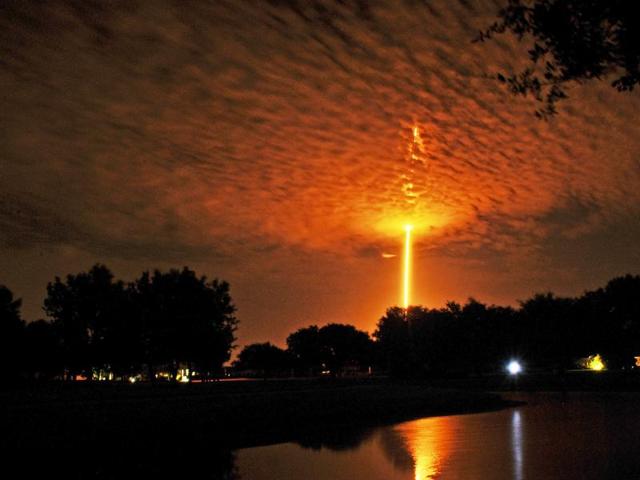 SpaceX Falcon 9 launches from Cape Canaveral, as seen from Woodside park in Viera.(AP Photo)