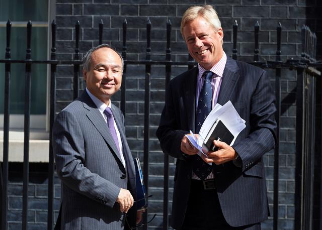Masayoshi Son (L), CEO of Japanese mobile giant SoftBank, and Stuart Chambers, chairman of British chip designer company ARM Holdings, outside 11 Downing street in central London on Monday, after a meeting with British finance minister Philip Hammond. (AFP) Masayoshi Son (L), CEO of Japanese mobile giant SoftBank, and Stuart Chambers, chairman of British chip designer company ARM Holdings, outside 11 Downing street in central London on Monday, after a meeting with British finance minister Philip Hammond. (AFP)