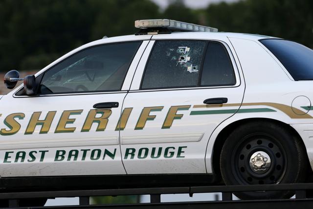 An East Baton Rouge Sheriff vehicle is seen with bullet holes in its windows near the scene where police officers were shot, in Baton Rouge, Louisiana. (Reuters Photo) An East Baton Rouge Sheriff vehicle is seen with bullet holes in its windows near the scene where police officers were shot, in Baton Rouge, Louisiana. (Reuters Photo)