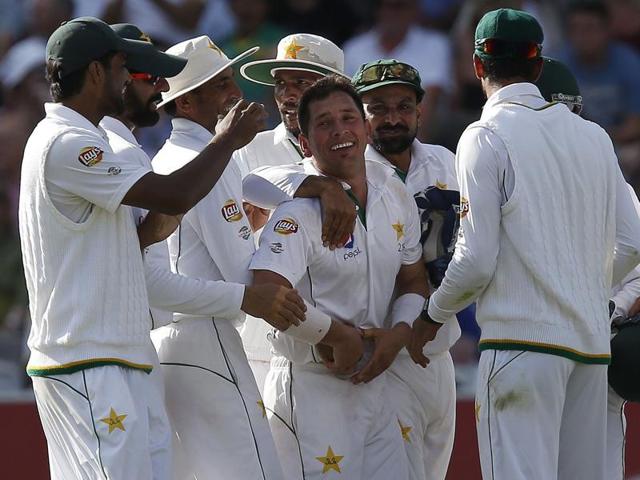 Pakistan's Yasir Shah is congratulated by team mates after taking the wicket of England's Jonny Bairstow. (AFP Photo) Pakistan's Yasir Shah is congratulated by team mates after taking the wicket of England's Jonny Bairstow. (AFP Photo)
