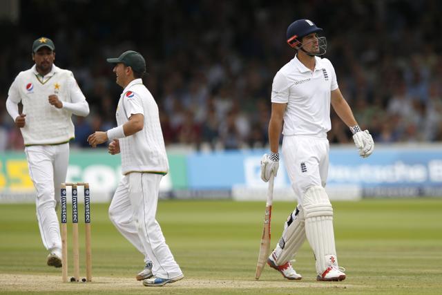 England's Alastair Cook walks off the field after being dismissed. (Reuters Photo) England's Alastair Cook walks off the field after being dismissed. (Reuters Photo)