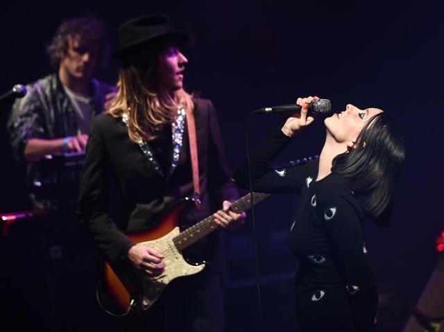 French guitarist Raoul Chichin (L) and French singer Simone Ringer of the band Minuit perform on stage during the festival. (AFP) French guitarist Raoul Chichin (L) and French singer Simone Ringer of the band Minuit perform on stage during the festival. (AFP)