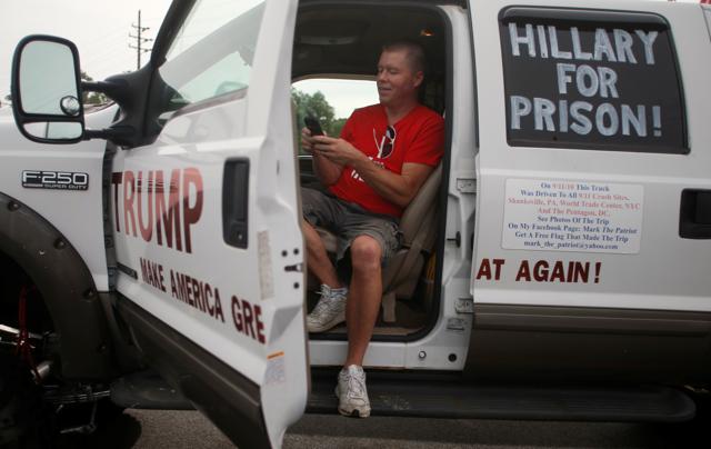 US Republican Presidential candidate Donald Trump supporter Mark Hoffman sits in his truck before driving to a “Bikers for Trump” rally in Cleveland, Ohio, US on Monday. (Reuters ) US Republican Presidential candidate Donald Trump supporter Mark Hoffman sits in his truck before driving to a “Bikers for Trump” rally in Cleveland, Ohio, US on Monday. (Reuters )