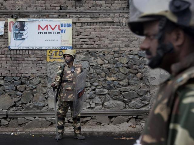 Paramilitary soldiers stand guard during the tenth straight day of curfew in Srinagar. (AP Photo) Paramilitary soldiers stand guard during the tenth straight day of curfew in Srinagar. (AP Photo)