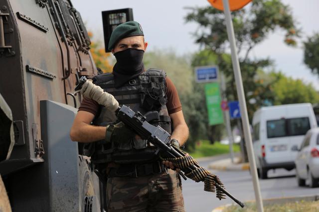 A member of the police special forces stands guard in front of the Air Force Academy in Istanbul. (Reuters) A member of the police special forces stands guard in front of the Air Force Academy in Istanbul. (Reuters)