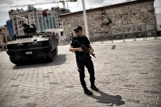 A police officer stands next to an armoured vehicle that was used by soldiers during the coup attempt at Taksim square in Istanbul. (AFP Photo) A police officer stands next to an armoured vehicle that was used by soldiers during the coup attempt at Taksim square in Istanbul. (AFP Photo)