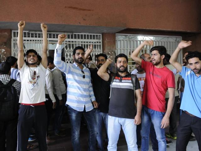 Kashmiri students protest outside the V-C’s office at Barkatullah University in Bhopal on Monday. (Mujeeb Faruqui/HT photo) Kashmiri students protest outside the V-C’s office at Barkatullah University in Bhopal on Monday. (Mujeeb Faruqui/HT photo)