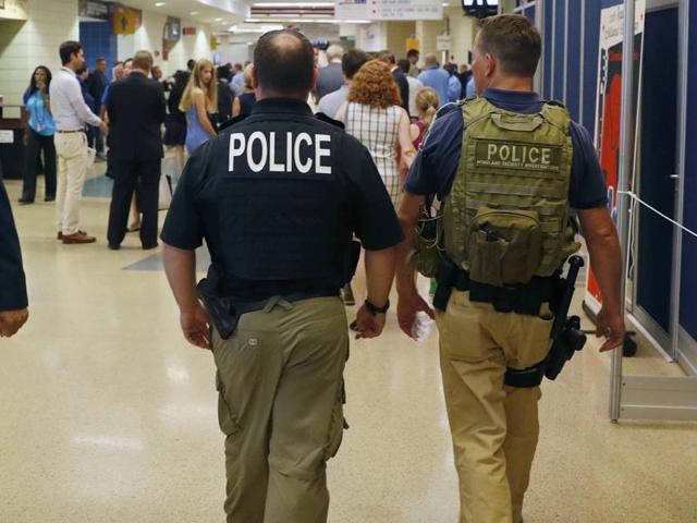 (Representative image) Police departments across the country are ordering officers to pair up after ambush attacks left eight officers dead in Texas and Louisiana. (AFP Photo) (Representative image) Police departments across the country are ordering officers to pair up after ambush attacks left eight officers dead in Texas and Louisiana. (AFP Photo)