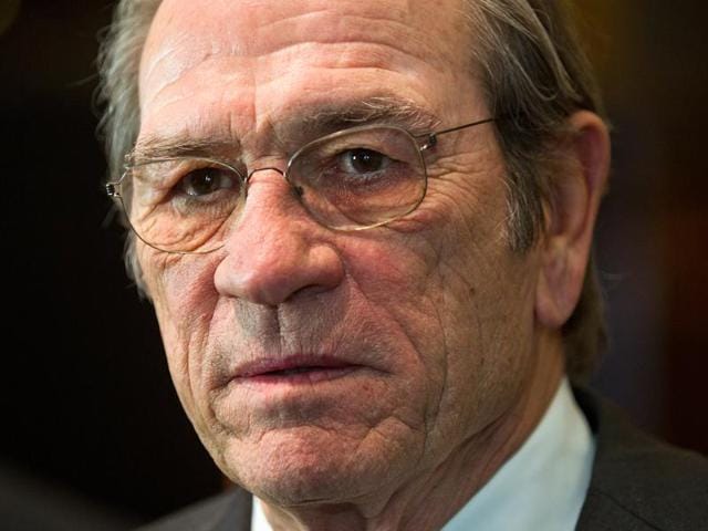 Actor Tommy Lee Jones, who plays the new CIA director Robert Dewey, arrives for the Universal Pictures movie premiere of Jason Bourne. (REUTERS) 