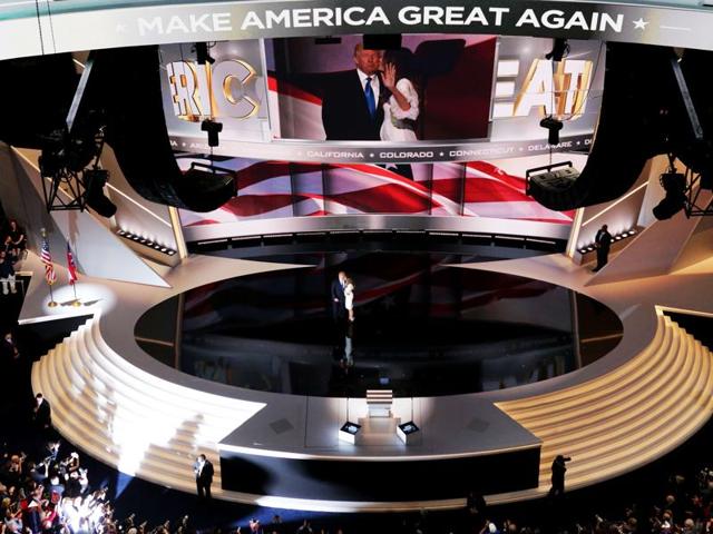 Melania Trump kisses her husband and presumptive Republican presidential nominee Donald Trump, after delivering a speech on the first day of the Republican National Convention at the Quicken Loans Arena in Cleveland, Ohio. (AFP Photo) Melania Trump kisses her husband and presumptive Republican presidential nominee Donald Trump, after delivering a speech on the first day of the Republican National Convention at the Quicken Loans Arena in Cleveland, Ohio. (AFP Photo)