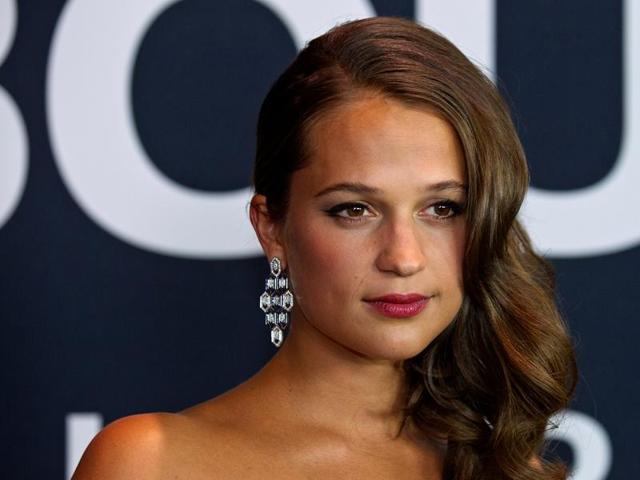 Swedish actor Alicia Vikander arrives for the Universal Pictures movie premiere of Jason Bourne.  (REUTERS) 