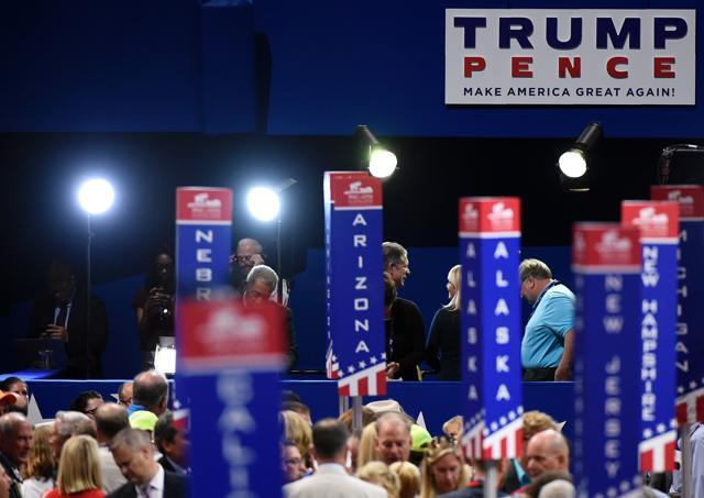 A Trump/Pence poster appears over the convention floor on the opening day of the Republican National Convention at the Quicken Loans arena in Cleveland, Ohio on Monday. (AFP) A Trump/Pence poster appears over the convention floor on the opening day of the Republican National Convention at the Quicken Loans arena in Cleveland, Ohio on Monday. (AFP)