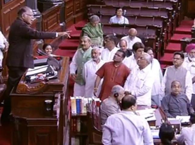 Deputy chairman of the Rajya Sabha, PJ Kurien, attempts restore order in the house as opposition leaders raised slogans against the BJP-led NDA over the violence against Dalits in Gujarat.(ANI)