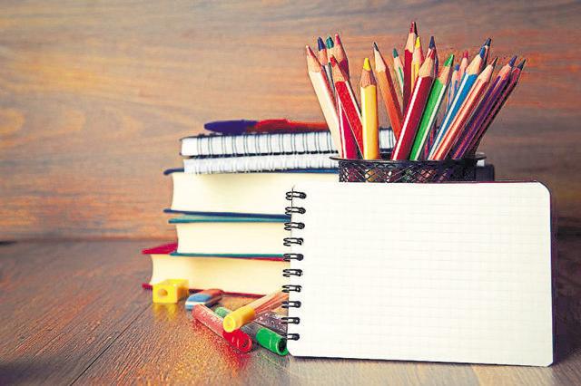 You need not carry more than two notebooks and a pen on the first day. (Shutterstock)