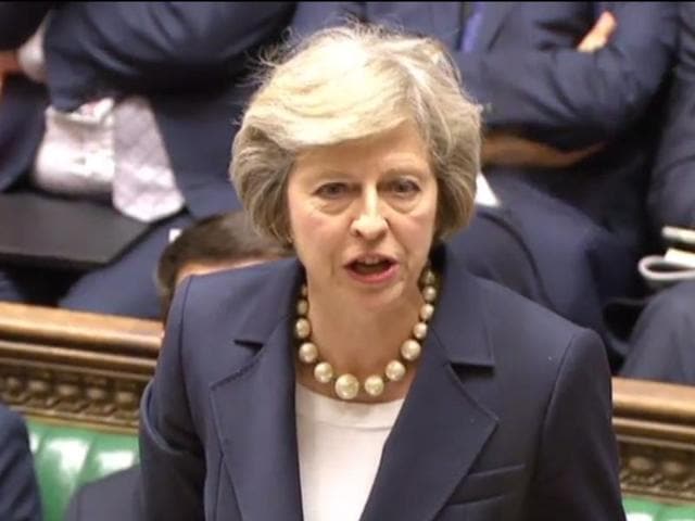 British Prime Minister Theresa May leaves 10 Downing street in London on Wednesday on her way to the House of Commons to face her first session of Prime Ministers Questions. (AFP) British Prime Minister Theresa May leaves 10 Downing street in London on Wednesday on her way to the House of Commons to face her first session of Prime Ministers Questions. (AFP)