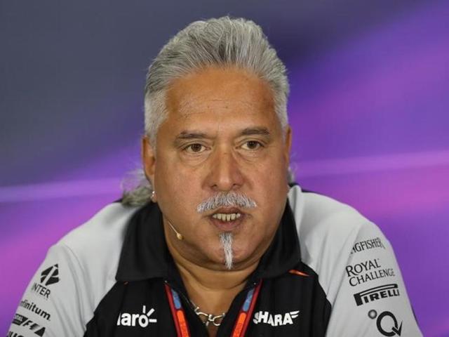Vijay Mallya was recently seen cheering on his Force India team from the pit during the British Grand Prix at the Silverstone track in Northamptonshire, England. (Reuters) Vijay Mallya was recently seen cheering on his Force India team from the pit during the British Grand Prix at the Silverstone track in Northamptonshire, England. (Reuters)