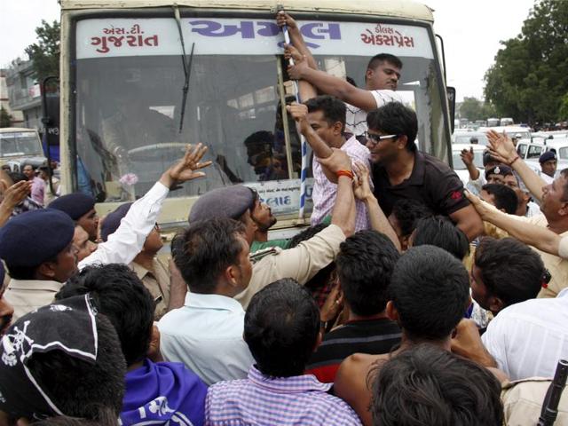 Members of Dalit community protest in Ahmedabad on Tuesday against the assault on Dalit members by “cow protectors” in Rajkot district, Gujarat.(PTI)