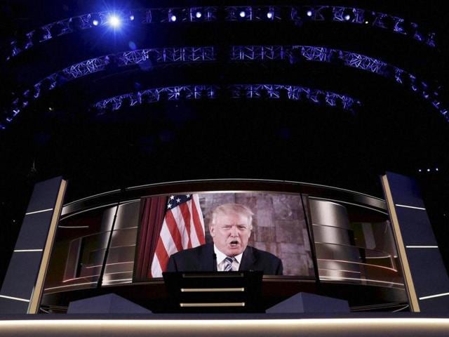 Republican presidential candidate Donald Trump speaks on screen during the second day of the Republican National Convention in Cleveland on Tuesday. The Republican Party formally nominated Trump for president. (AFP) Republican presidential candidate Donald Trump speaks on screen during the second day of the Republican National Convention in Cleveland on Tuesday. The Republican Party formally nominated Trump for president. (AFP)