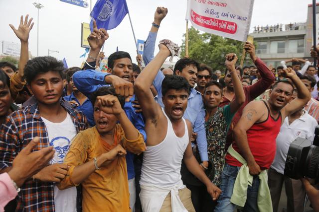 Police detain members of the Dalit Community who were protesting against the Una incident, in Ahmedabad, July 19(PTI)