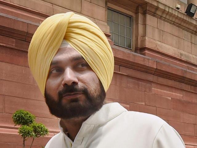 Former Rajya Sabha MP Navjot Singh Sidhu arrives at Parliament House on the opening day of the monsoon session in New Delhi. (PTI Photo) Former Rajya Sabha MP Navjot Singh Sidhu arrives at Parliament House on the opening day of the monsoon session in New Delhi. (PTI Photo)