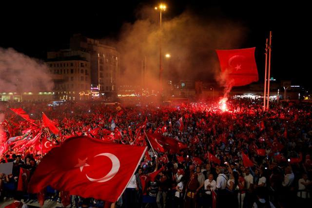 Supporters of Turkish President Erdogan wave Turkish national flags during a pro-government demonstration on Taksim square in Istanbul. (Reuters) Supporters of Turkish President Erdogan wave Turkish national flags during a pro-government demonstration on Taksim square in Istanbul. (Reuters)