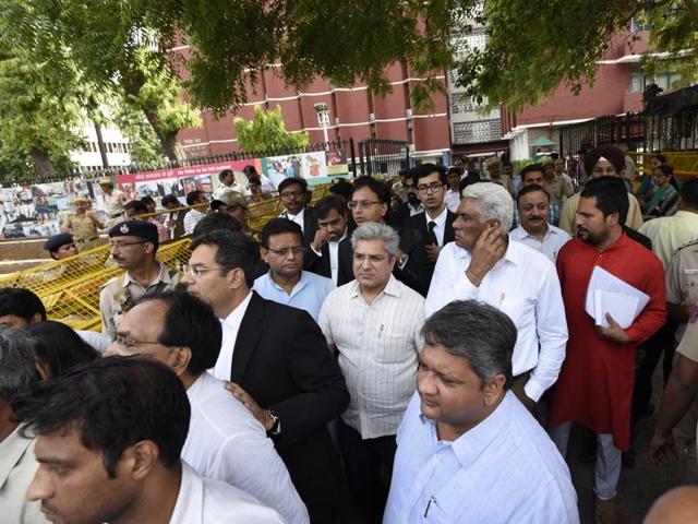 With FIRs lodged against 11 AAP MLAs for offences ranging from domestic violence and molestation to forged degrees, others are wondering if cases would be lodged against them in the future. (Hindustan Times) With FIRs lodged against 11 AAP MLAs for offences ranging from domestic violence and molestation to forged degrees, others are wondering if cases would be lodged against them in the future. (Hindustan Times)