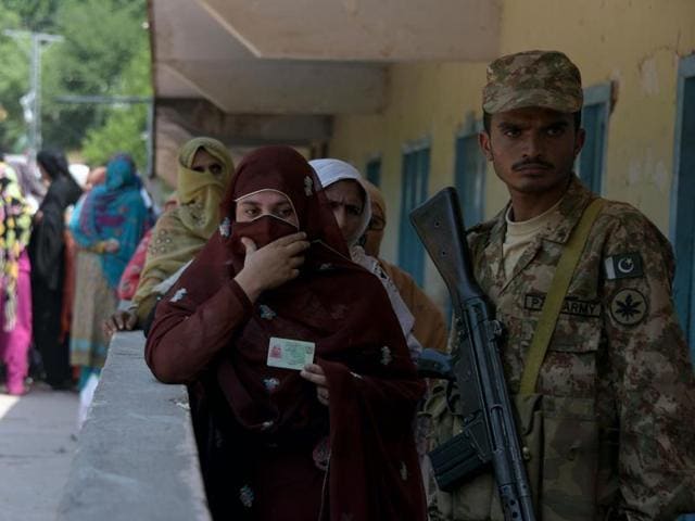 An elderly Kashmiri casts his ballot at a polling station in the elections in Muzaffarabad, the capital of Pakistan-occupied Kashmir on Thursday. (AFP) An elderly Kashmiri casts his ballot at a polling station in the elections in Muzaffarabad, the capital of Pakistan-occupied Kashmir on Thursday. (AFP)