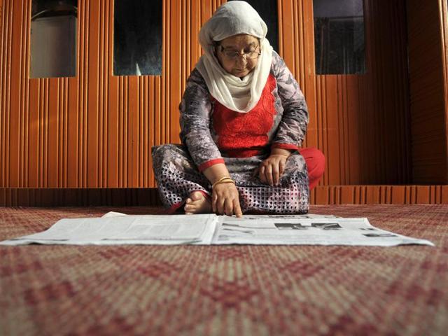 A Kashmiri woman reads the morning newspaper at her home in Srinagar on Thursday. (Waseem Andrabi/HT photo) A Kashmiri woman reads the morning newspaper at her home in Srinagar on Thursday. (Waseem Andrabi/HT photo)