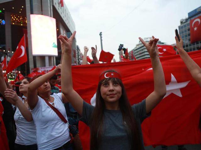 Pro Erdogan supporters wave Turkish flags during a rally at Kizilay Square in Ankara on Wednesday. Vienna has called Turkey’s ambassador over concerns that Turkey is now developing increasingly authoritarian traits. (AFP) Pro Erdogan supporters wave Turkish flags during a rally at Kizilay Square in Ankara on Wednesday. Vienna has called Turkey’s ambassador over concerns that Turkey is now developing increasingly authoritarian traits. (AFP)