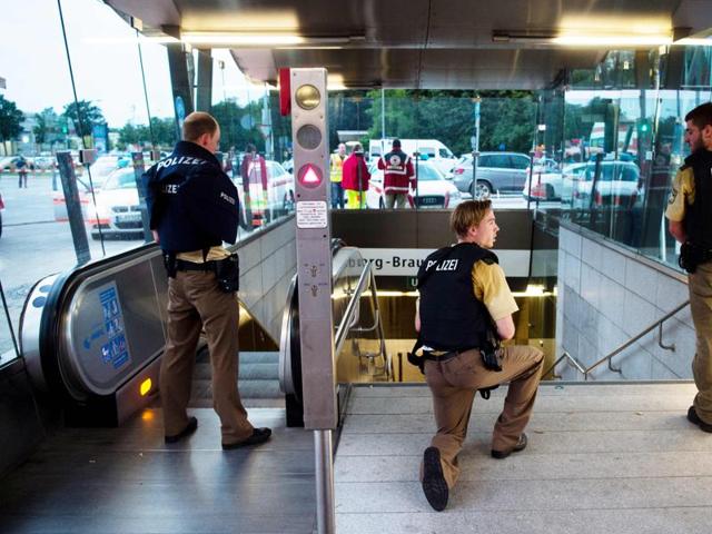 Police secure the entrance to a subway station near a shopping mall where a shooting took place, in Munich. (AFP Photo) Police secure the entrance to a subway station near a shopping mall where a shooting took place, in Munich. (AFP Photo)