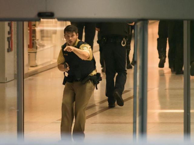 Police secures the area inside a shopping centre in Munich following a shooting. (AFP Photo) Police secures the area inside a shopping centre in Munich following a shooting. (AFP Photo)
