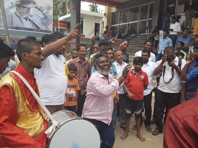 Fans burst into a song and dance ritual in the midst of drums at Albert Theatre in Chennai on Friday. (ADitya Iyer/HT Photo)