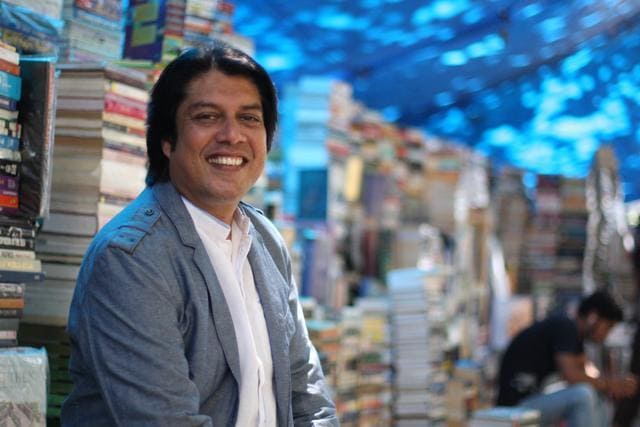 Author Piyush Jha at a roadside bookstall in Fort, Mumbai.
