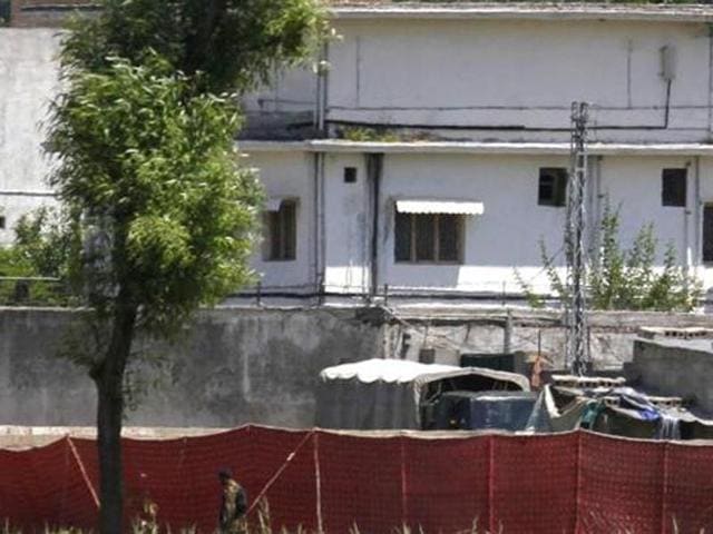In this file photo, Pakistani soldier stands near a compound in Abbottabad where al Qaeda leader Osama bin Laden was killed by US Navy Seals. (AP) In this file photo, Pakistani soldier stands near a compound in Abbottabad where al Qaeda leader Osama bin Laden was killed by US Navy Seals. (AP)