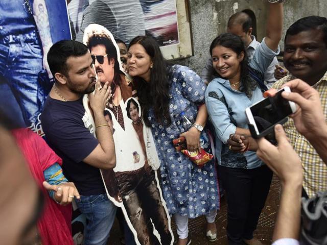 Rajinikanth fans pose with his cut-out ahead of Kabali’s screening in Mumbai on Friday. (HT Photo) Rajinikanth fans pose with his cut-out ahead of Kabali’s screening in Mumbai on Friday. (HT Photo)