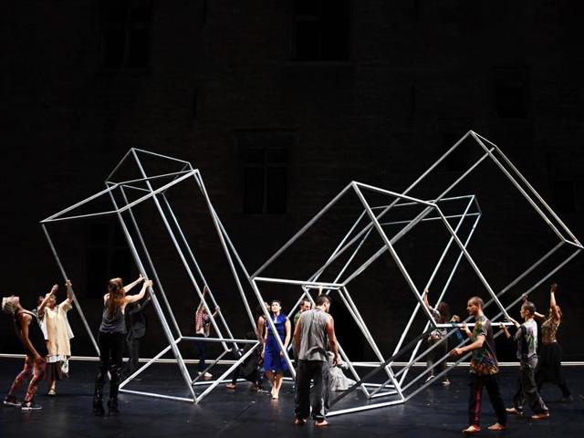 Dancers perform during a rehearsal of the play ‘Babel 7.16’ directed by choreographers Sidi Larbi Cherkaoui and Damien Jalet on July 19, 2016 at the Cour d'honneur du Palais des Papes in Avignon. (AFP) Dancers perform during a rehearsal of the play ‘Babel 7.16’ directed by choreographers Sidi Larbi Cherkaoui and Damien Jalet on July 19, 2016 at the Cour d'honneur du Palais des Papes in Avignon. (AFP)