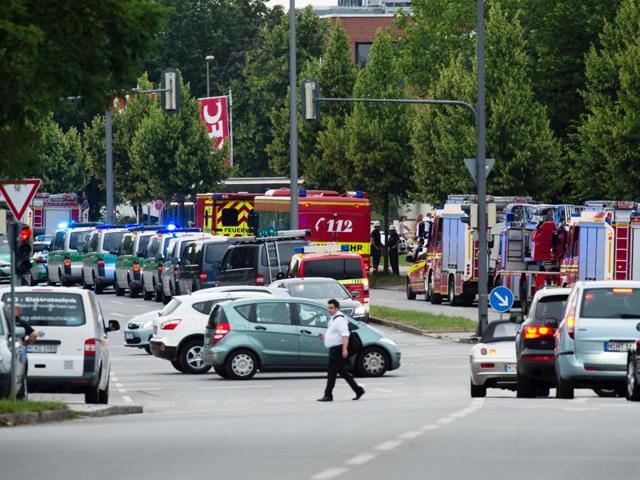 Police cars and fire trucks stand near a shopping centre in which a shooting was reported in Munich, southern Germany. (AP Photo) Police cars and fire trucks stand near a shopping centre in which a shooting was reported in Munich, southern Germany. (AP Photo)